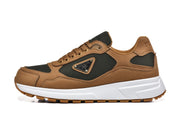 Side view of a brown and dark green-black low-top sneaker with lace-up closure and triangular side plaque.