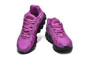 Top-front view of purple Nike Air Max DN 8 sneakers with lace-up fastening.