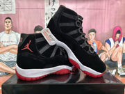 Pair of black high-top basketball sneakers shown from side and three-quarter angles with red accents and white midsoles.