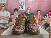 Front view of brown Nike sneakers showing camouflage-patterned toe panels, tonal laces and padded collars.
