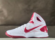 Opposite side view of the white and red high-top basketball shoe.