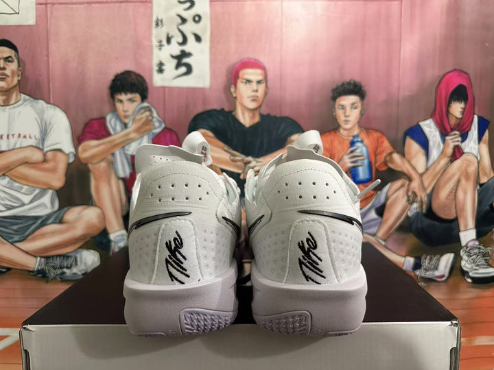 Rear view of white basketball shoes with black heel accents