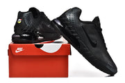 Black Nike Air Max sneakers displayed with a Nike shoe box.