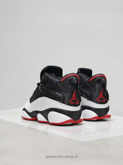 Rear view showing black heels, white lower panels, red detailing, and Jordan branding.