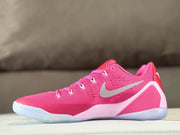 Opposite side view showing the pink mesh upper, silver Swoosh, and light pink midsole overlays.