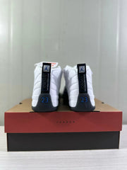 Rear view of the pair showing Jordan branding, blue-accented number 23 details, and white quilted panels.