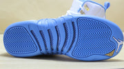 Close-up of the outsole with herringbone tread and patterned traction channels.
