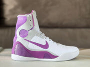 Side view of a white and purple Nike Kobe 9 high-top basketball shoe.