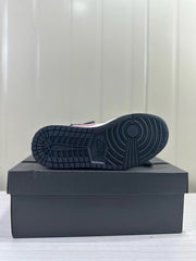 Close view of the dark rubber outsole tread