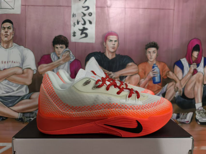 Side view of a white and bright orange Nike basketball shoe with red laces and black Swoosh-style detail.