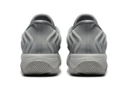 Rear view of the gray sneakers showing padded heels and sculpted soles