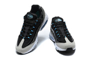 Front view of a pair of black, grey and blue Nike Air Max 95 TT sneakers.