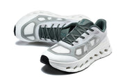 Pair of white and gray On lace-up sneakers in angled views