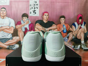 Rear view showing the padded collars, heel accents, and basketball-player emblems.