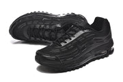 Pair of black Nike Air Max 97 OG sneakers in a three-quarter view