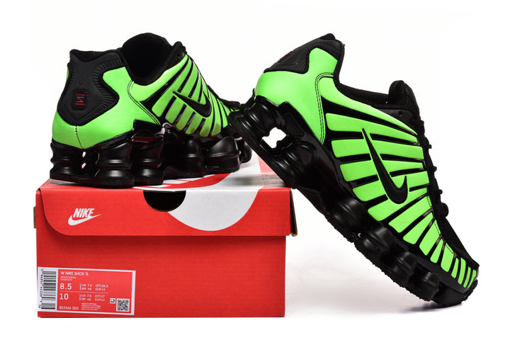 Green-and-black Nike Shox TL sneakers displayed with a shoe box.