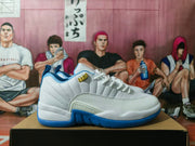 Side view of a white and blue Jordan sneaker showing textured panels, blue outsole accents, and a visible Jumpman detail.