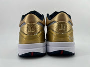 Rear view of both shoes with gold heel panels and the number 10 detail.