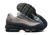 Side and outsole views showing the black tread and visible cushioning windows
