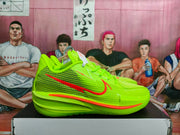 Side profile highlighting the perforated-looking upper panels, red swoosh and layered sculpted outsole.