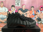 Side profile of a black high-top sneaker showing the molded ribbed upper, lace panel, pull tab, and sculpted sole.