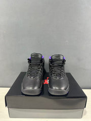 Front view of the pair showing padded tongues, black laces, and purple collar details.