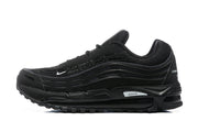 Side view of a black Nike Air Max 97-style sneaker with layered wavy panels and small white Swoosh detail.