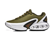 Side view of an olive green Nike Air Max DN sneaker with white midsole and visible cushioning pods.