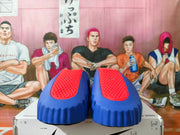 Pair of blue slides showing red perforated footbeds.