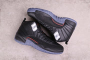 Overhead view of the black Air Jordan 12 pair.