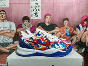 Side view highlighting the red Nike swoosh, multicolor graphic upper, white midsole, and blue outsole.