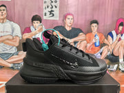Side view of a black Nike basketball sneaker showing the swoosh, textured upper, laces, and molded outsole.