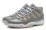 Close front three-quarter view of the gray and white high-top sneaker pair.