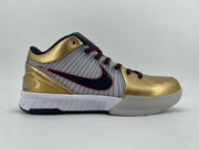 Side profile of the sneaker with gold heel and toe details and a dark side logo.