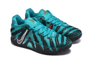 Pair of teal and black sneakers shown at a three-quarter angle with lace-up fronts and contrasting side logos.