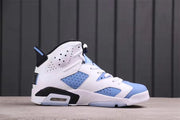 Side profile showing the white and University Blue upper, black midsole accents, and visible heel cushioning window.