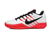 Side profile highlighting the black Swoosh, white upper, and red outsole.