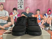 Front view of black Nike Sabrina basketball shoes showing the laces and toe shape.