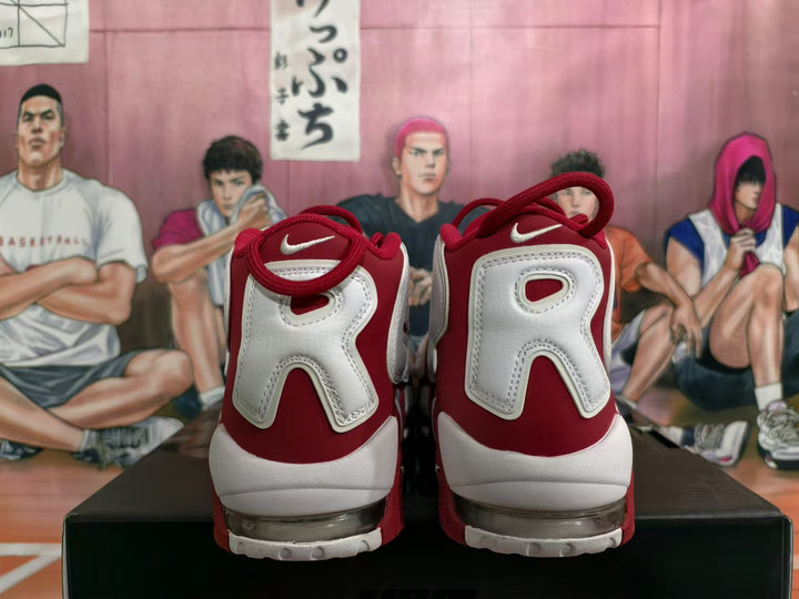 Rear view of red and white Nike Air More Uptempo sneakers
