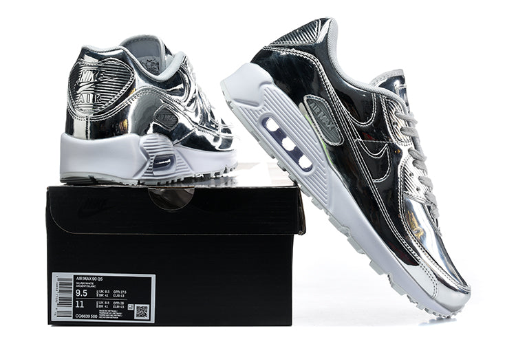 Nike Air Max 90 QS silver and black sneakers displayed on a box with the label visible.