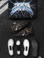 Nike sneakers and separated white cushioning components displayed beside the branded box.