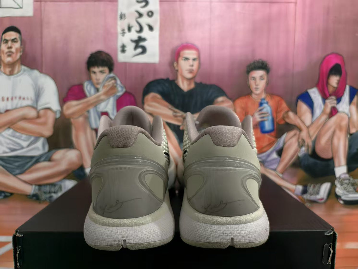 Rear view of the Nike All-Star 2.0 sneakers showing the padded collars, heel panels and light-colored soles.