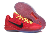 Side profile of a red basketball shoe with a black Swoosh and translucent outsole, alongside an outsole view.