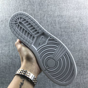 Close view of the sneaker's patterned rubber outsole.