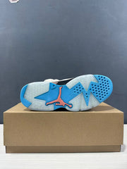 Outsole view showing the translucent and blue traction sections with a contrasting Jordan emblem.