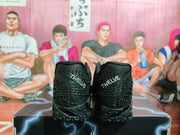 Rear view of black Nike basketball sneakers showing textured heels and white tongue branding.