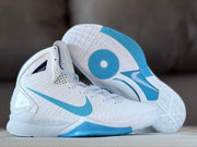 Nike Hyperdunk sneaker displayed with its patterned white and Carolina blue outsole visible.