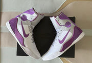 Overhead angled view showing both shoes and their purple side accents.