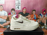 Side view showing the metallic-look Swoosh and visible midsole air window