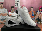 Angled view of two white Nike basketball sneakers showing the side Swoosh, textured upper, and contrasting black heel panels.
